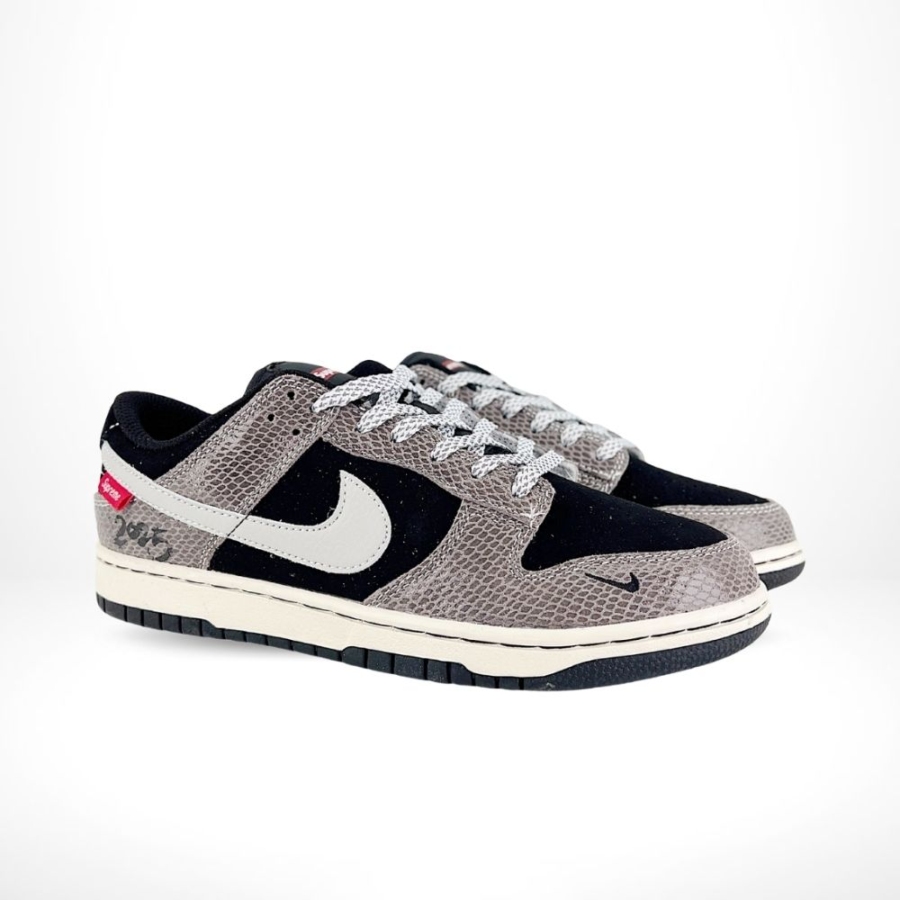 Angled front view of a full pair of Nike SB Dunk Low