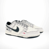 Angled front view of a full pair of Nike SB Dunk Low