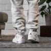 Real lifestyle image of Air Jordan 4
