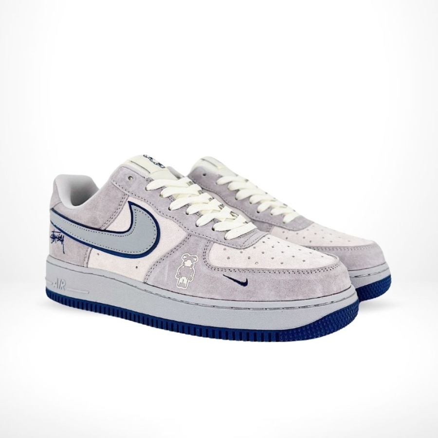 Angled front view of a full pair of Nike SB Dunk Low