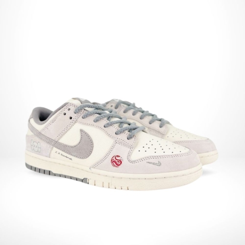 Angled front view of a full pair of Nike SB Dunk Low