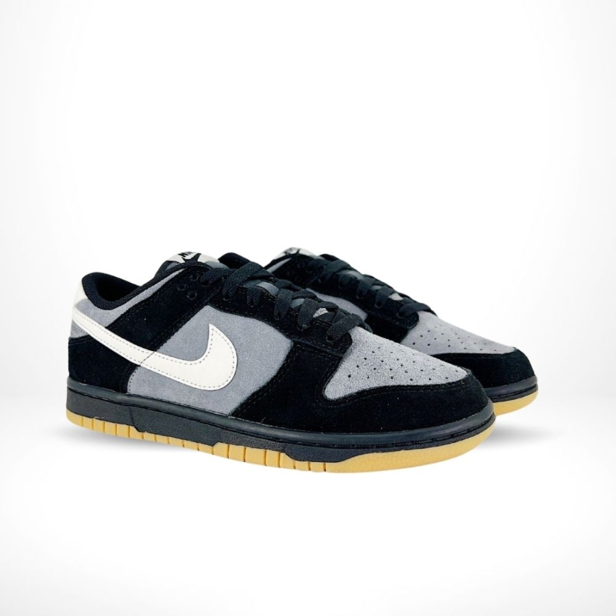 Angled front view of a full pair of Nike SB Dunk Low