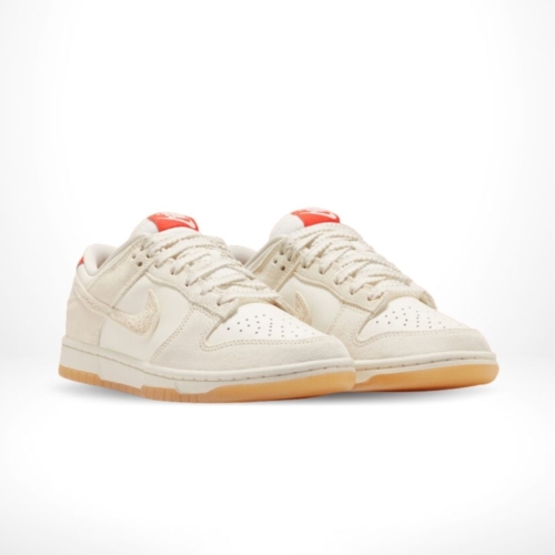 Angled front view of a full pair of Nike Dunk Low