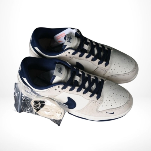Angled front view of a full pair of Nike Dunk Low