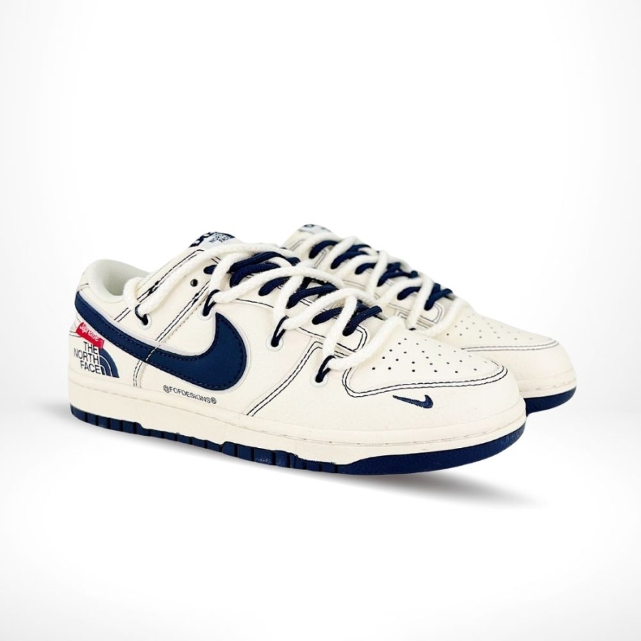 Angled front view of a full pair of Nike Dunk Low