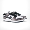 Angled front view of a full pair of Nike Dunk Low