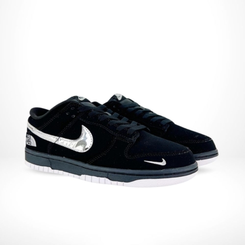 Angled front view of a full pair of Nike SB Dunk Low