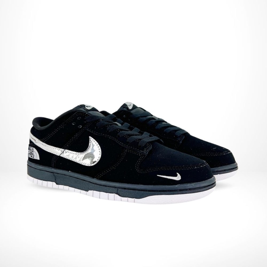 Angled front view of a full pair of Nike SB Dunk Low