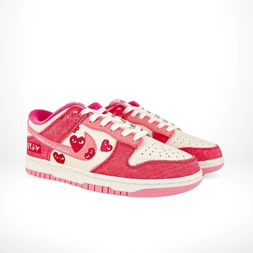 Angled front view of a full pair of Nike SB Dunk Low