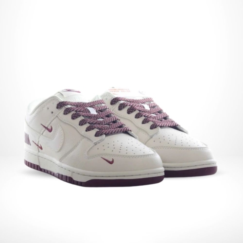 Angled front view of a full pair of Nike Dunk Low