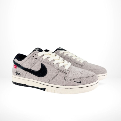 Angled front view of a full pair of Nike SB Dunk Low