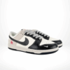 Angled front view of a full pair of Nike SB Dunk Low