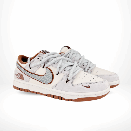 Angled front view of a full pair of Nike SB Dunk Low