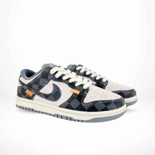 Angled front view of a full pair of Nike SB Dunk Low