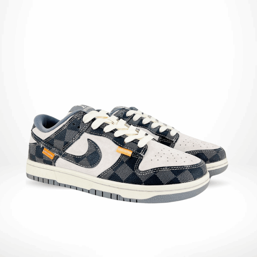 Angled front view of a full pair of Nike SB Dunk Low