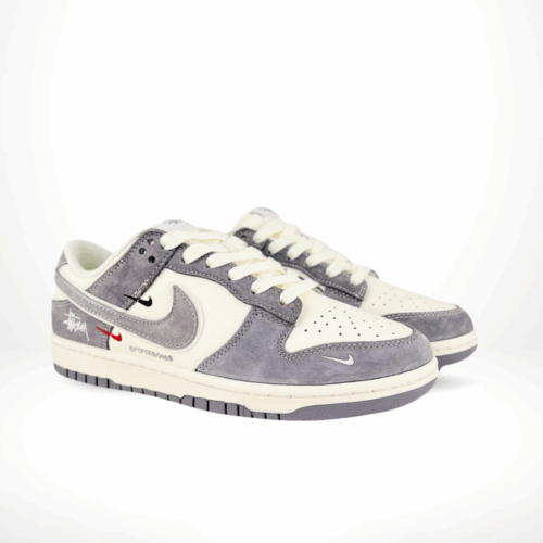 Angled front view of a full pair of Nike SB Dunk Low