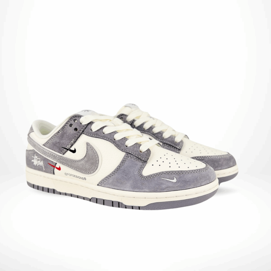 Angled front view of a full pair of Nike SB Dunk Low