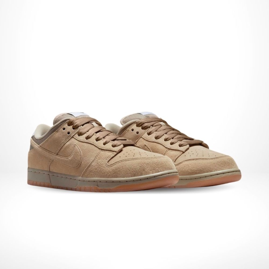 Angled front view of a full pair of Nike Dunk Low