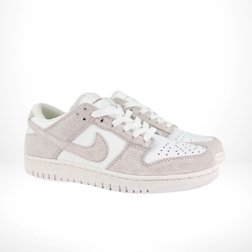 Angled front view of a full pair of Nike SB Dunk Low