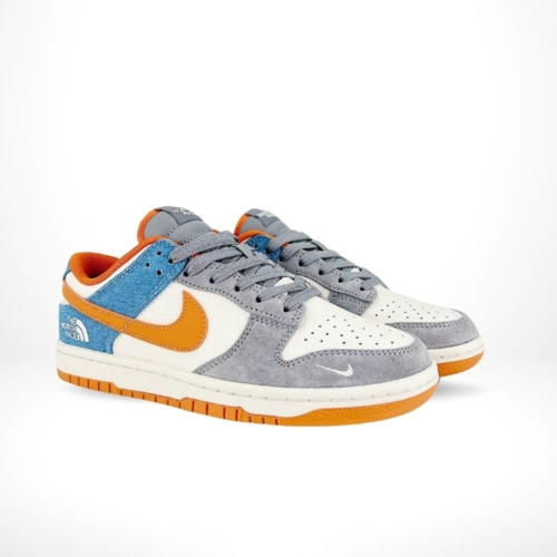 Angled front view of a full pair of Nike SB Dunk Low
