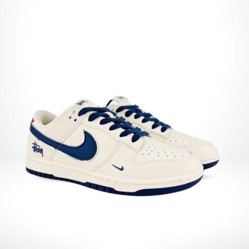 Angled front view of a full pair of Nike SB Dunk Low