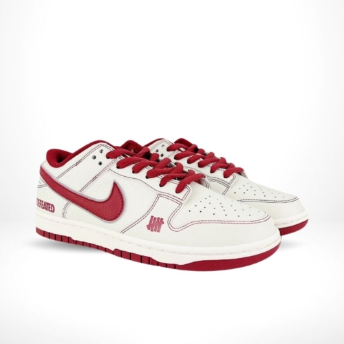 Angled front view of a full pair of Nike SB Dunk Low