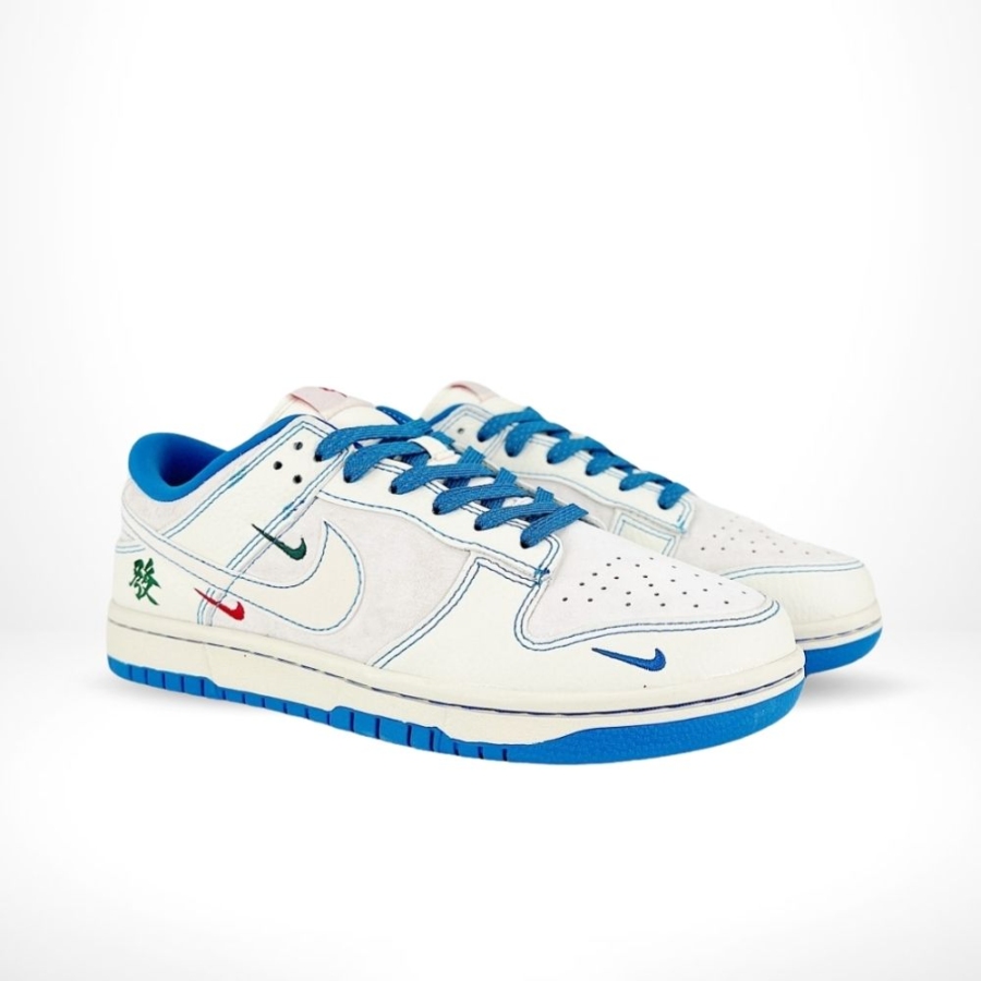 Angled front view of a full pair of Nike SB Dunk Low