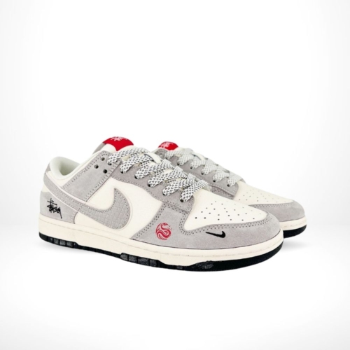 Angled front view of a full pair of Nike SB Dunk Low