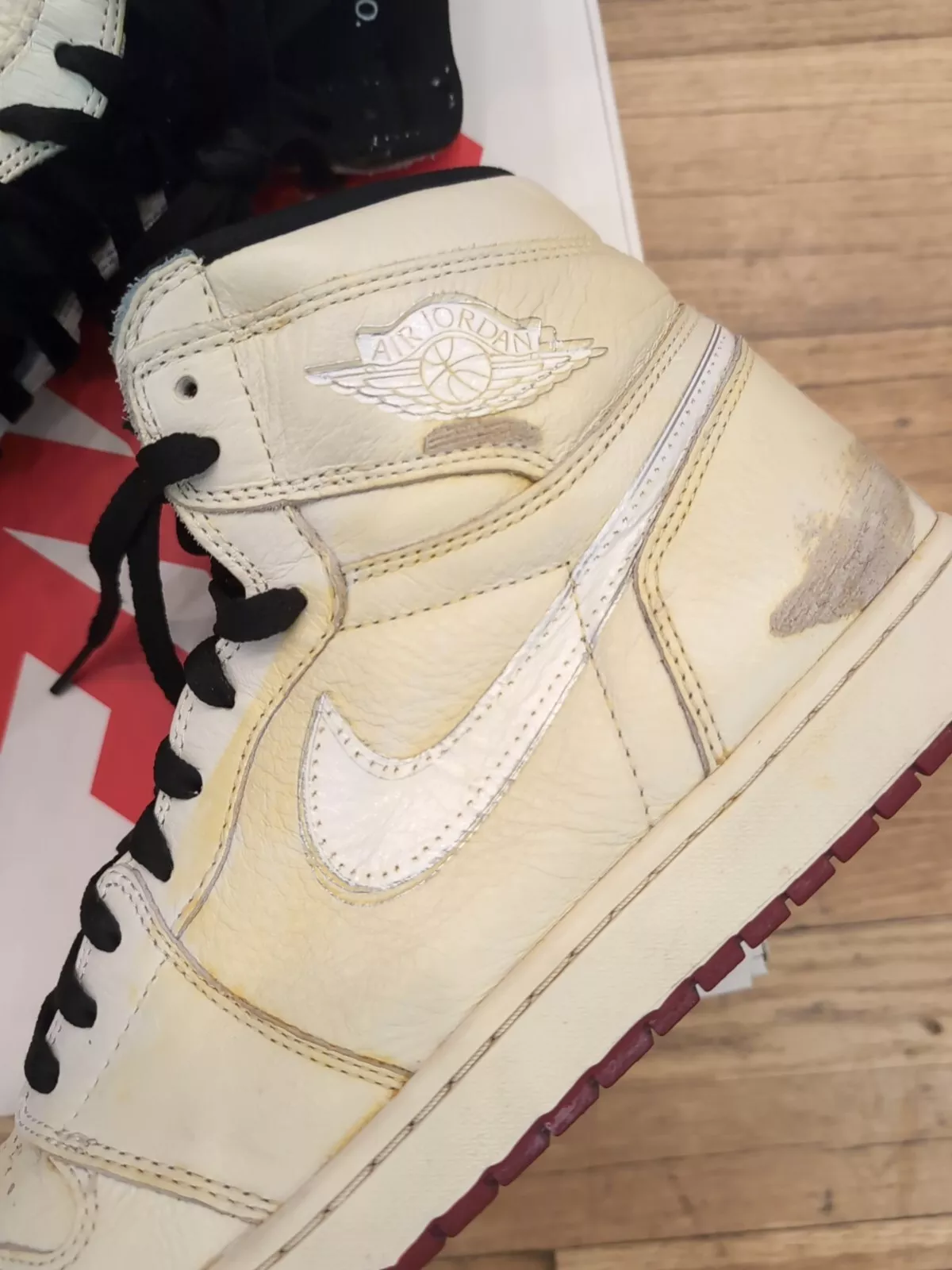Air Jordan 1 Retro High X Nigel Sylvester Sail Varsity Red photo review