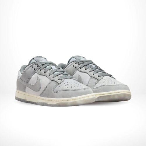 Angled front view of a full pair of Nike Dunk Low
